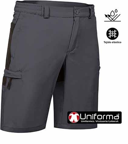 Pantalón de trabajo tipo bermudas en tejido elástico, hidrofugado, resistente a las salpicaduras de lejía y cloro, para empresas de mantenimiento de piscinas, limpieza, socorristas y empresas químicas. 