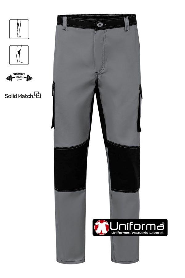 Pantalón reforzado bicolor V103020B Pantalón de trabajo duro y resistente de gramaje alto con refuerzos de tejido en culera y rodilleras, de diseño bicolor, de la gama solid Match, personalizable con logo de empresa en uniforma.