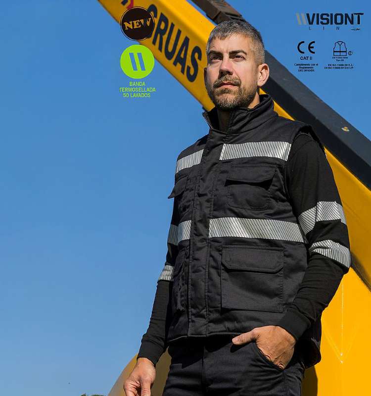Chaleco  de trabajo Acolchado Multibolsillos con cierre de cremallera central, Bandas Reflectantes segmentadas discontinuas, personalizable con logo de empresa en Uniforma. - AN18023